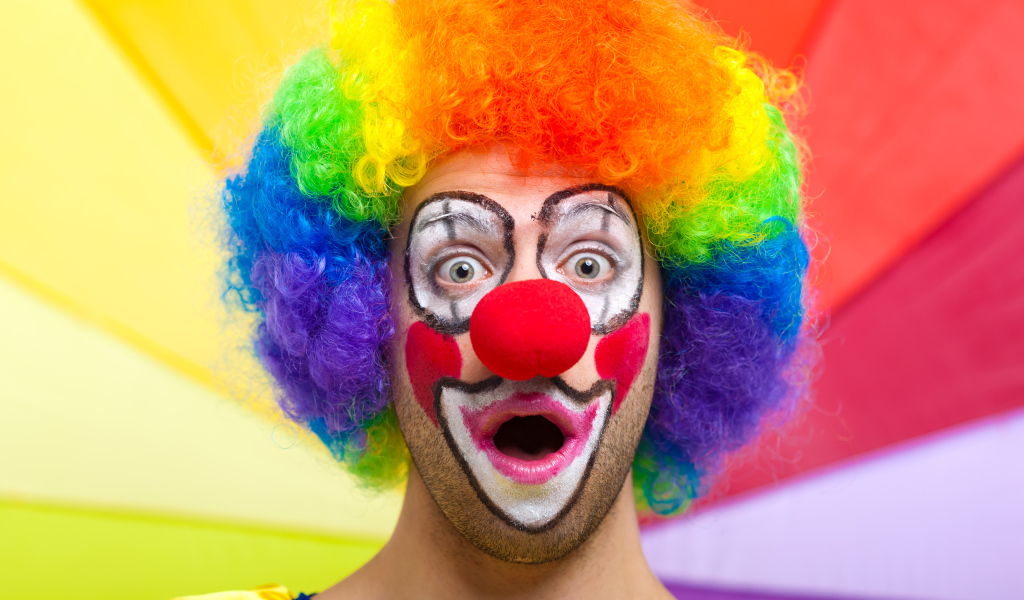 Surprised man in a clown costume
