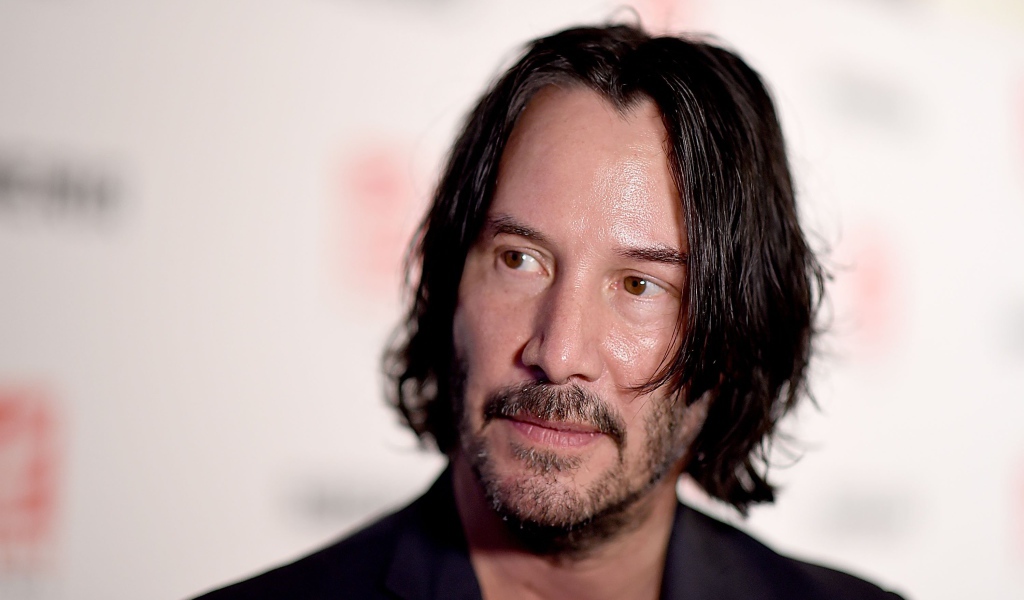 Кареглазый мужчина, актер Киану Ривз