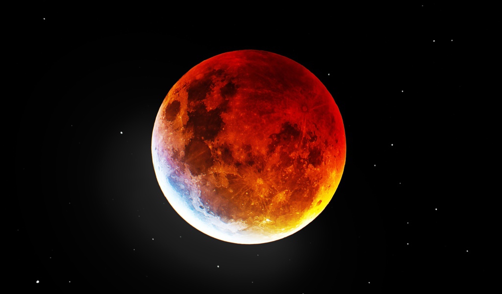 Большая огненная луна на черном фоне