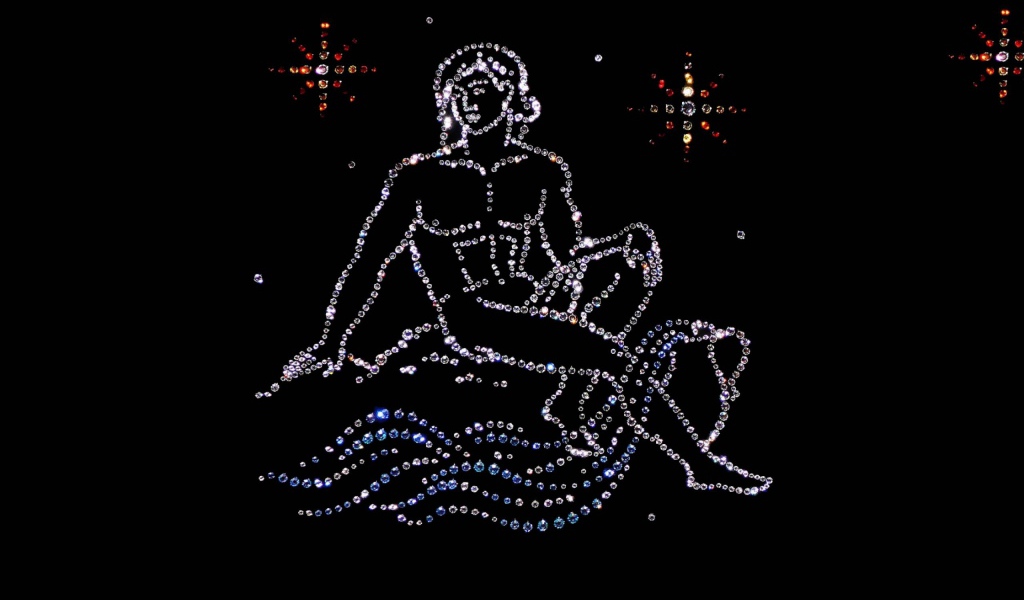 Блестящий знак зодиака водолей  на черном фоне