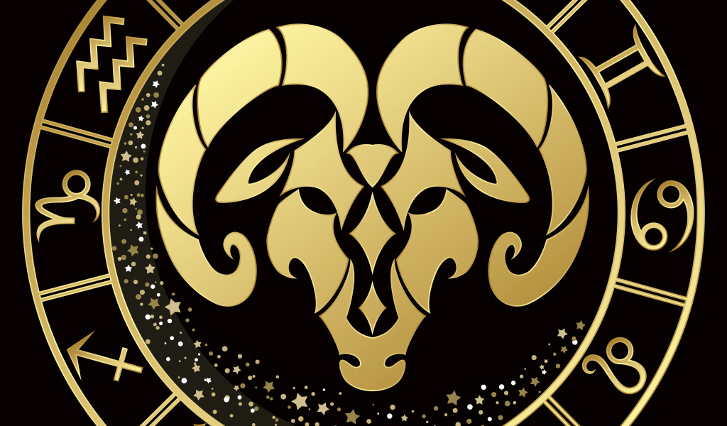 Золотой знак зодиака овен на черном фоне