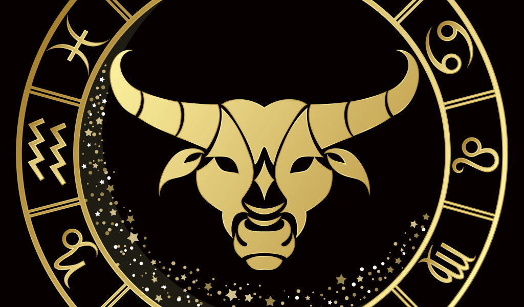 Золотой знак зодиака телец на черном фоне