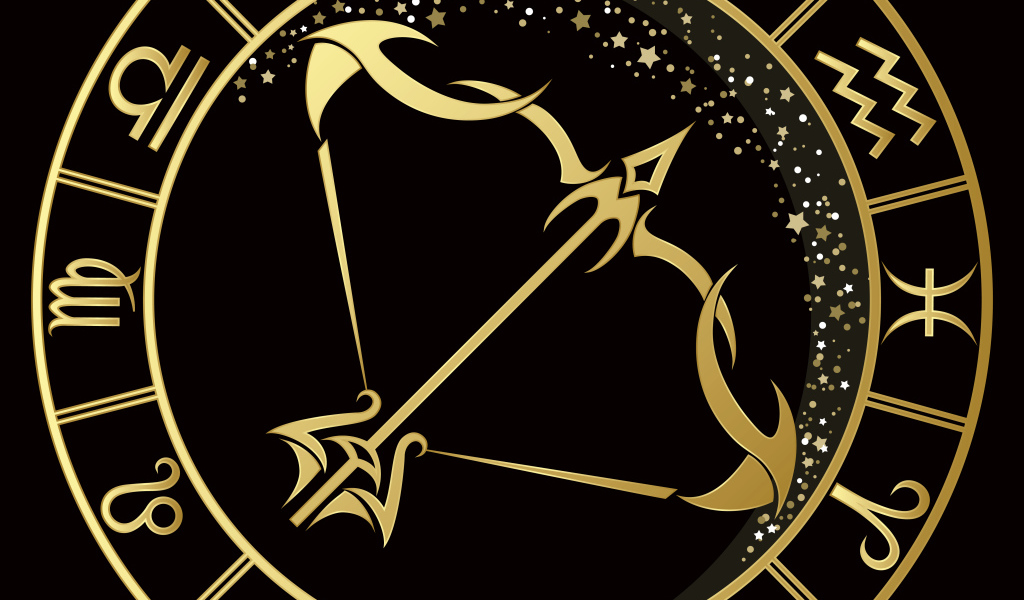 Золотой знак зодиака стрелец на черном фоне