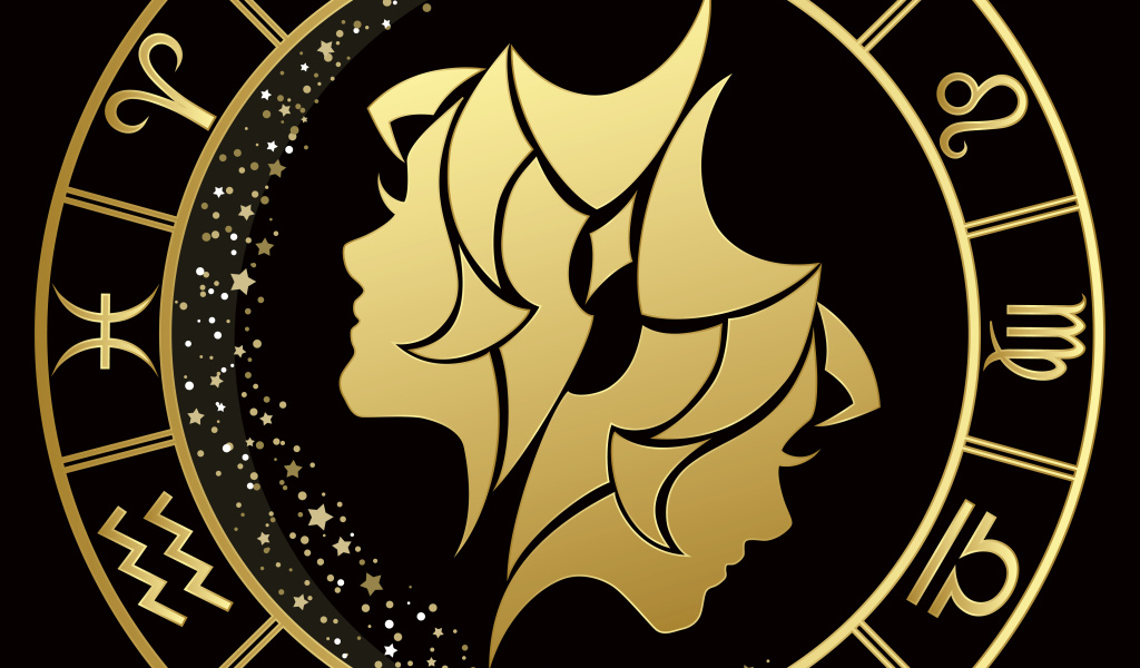 Золотой знак зодиака близнецы на черном фоне