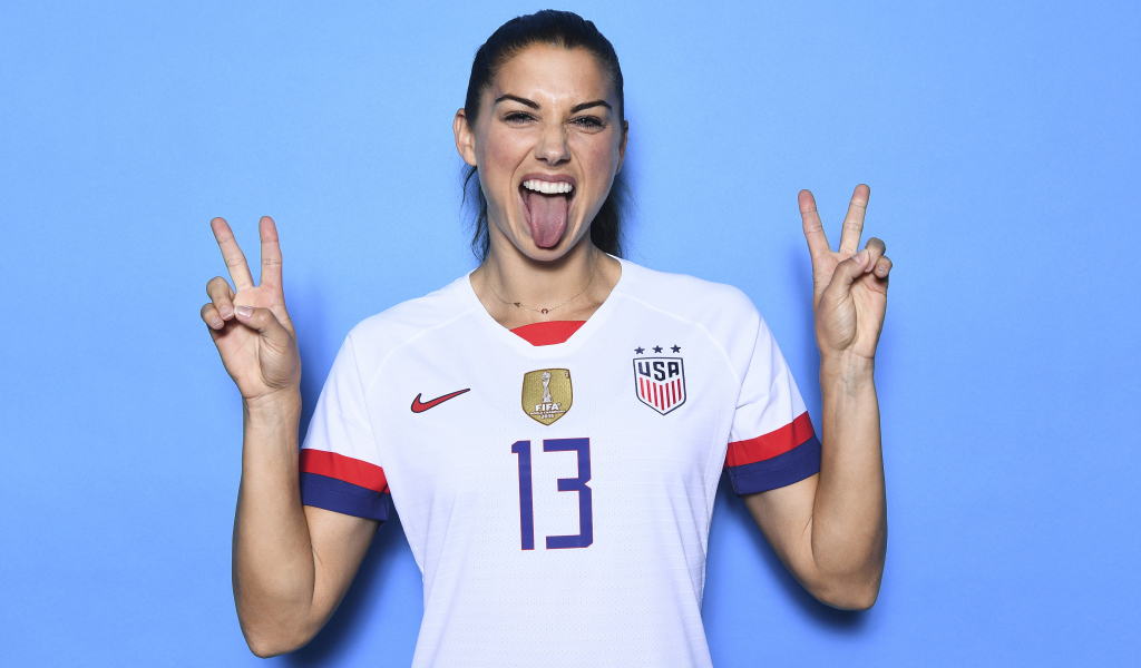 American footballer Alex Morgan with her tongue out
