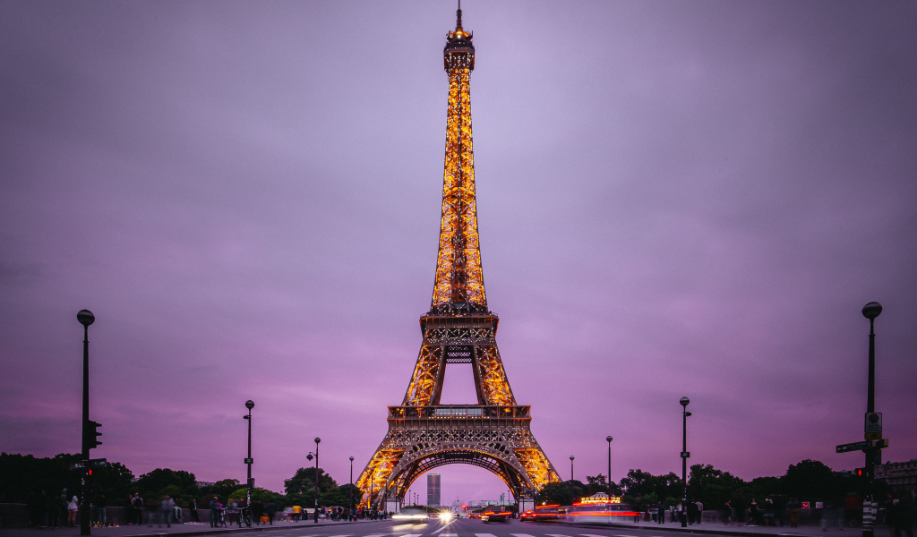 Beautiful Eiffel Tower in Paris on a background of purple sky