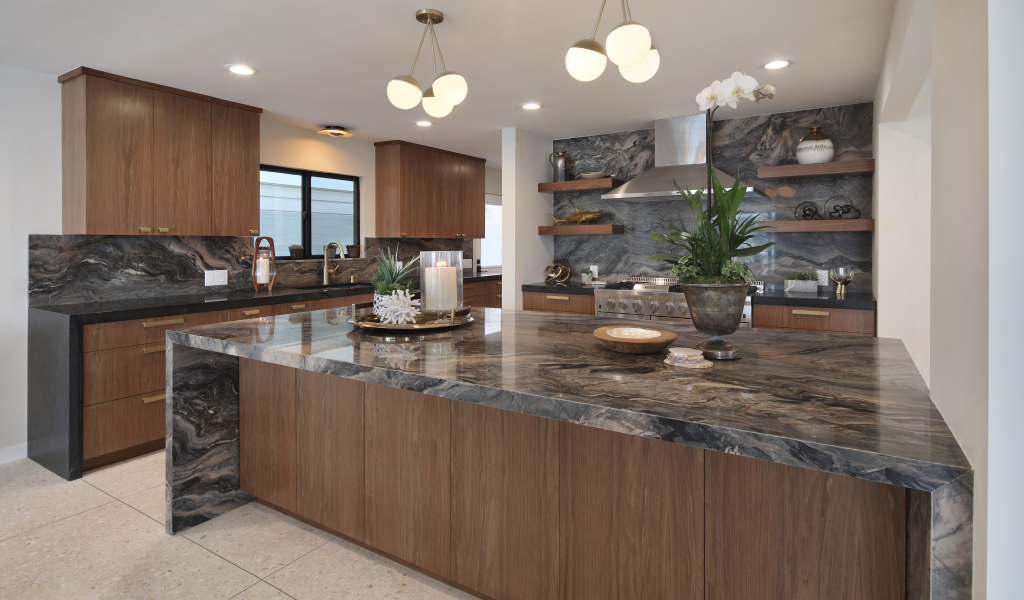 Beautiful brown kitchen with granite tables