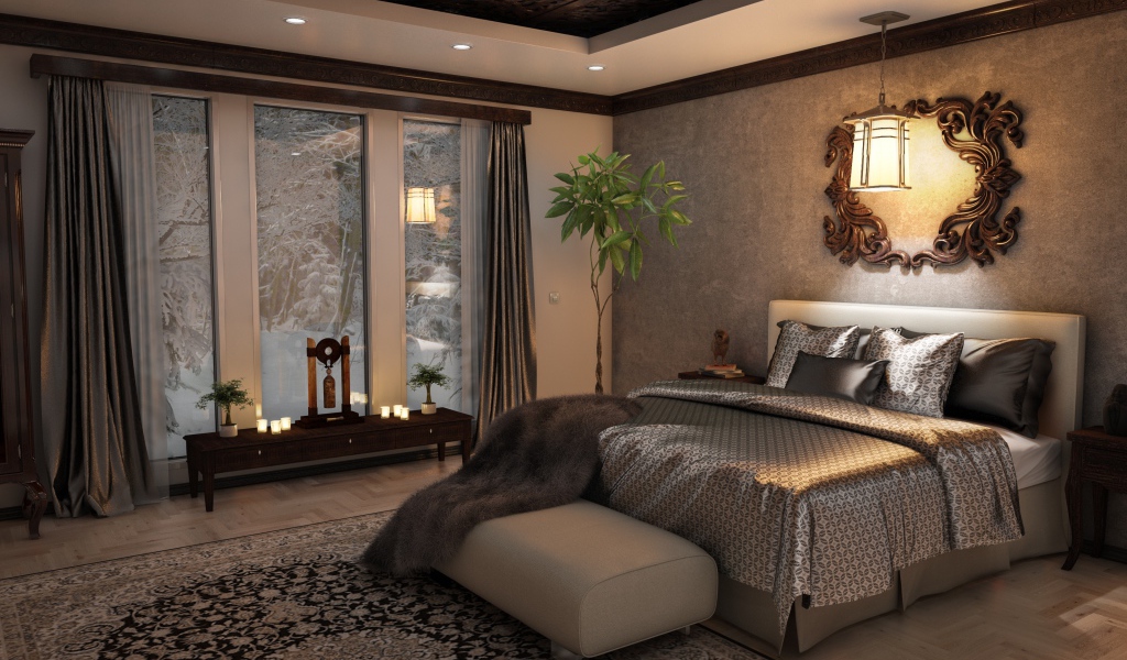 Большая кровать с красивым покрывалом в спальне с большим окном 