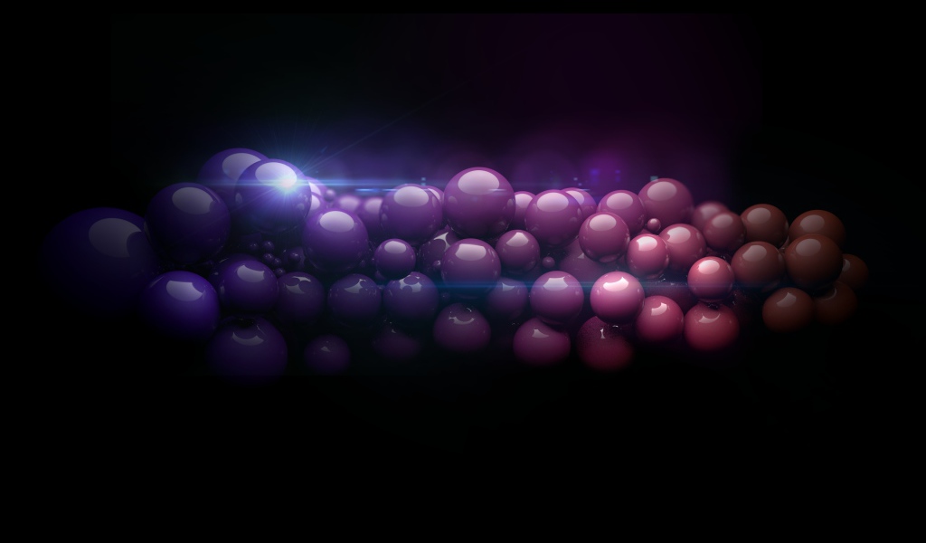 Нить из разноцветных шаров на черном фоне 