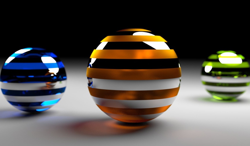Разноцветные 3д шары на серой поверхности 