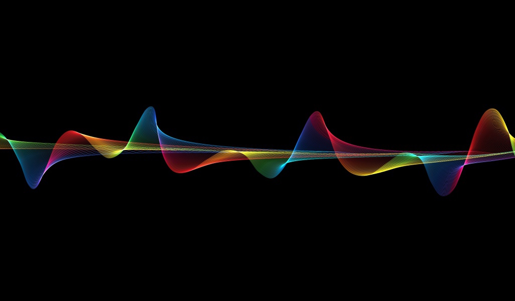 Осциллограмма цвета радуги на черном фоне