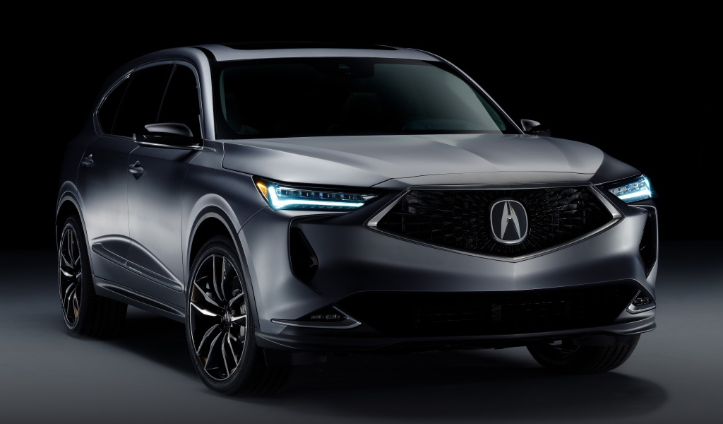 Серебристый автомобиль Acura MDX Prototype 2020 года на черном фоне