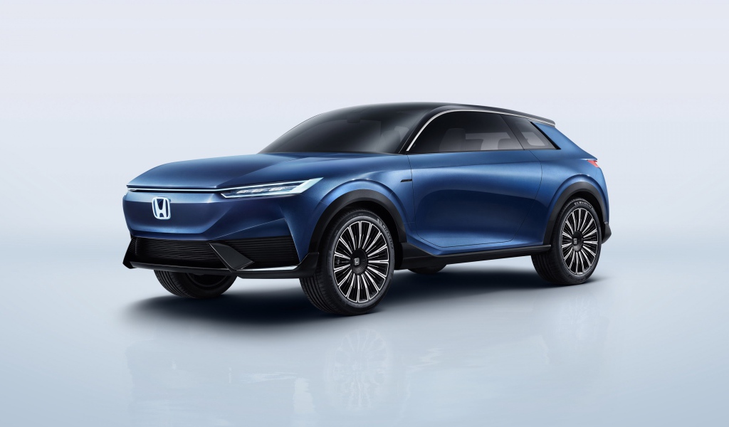 Синий автомобиль Honda SUV Econcept 2020 года на сером фоне