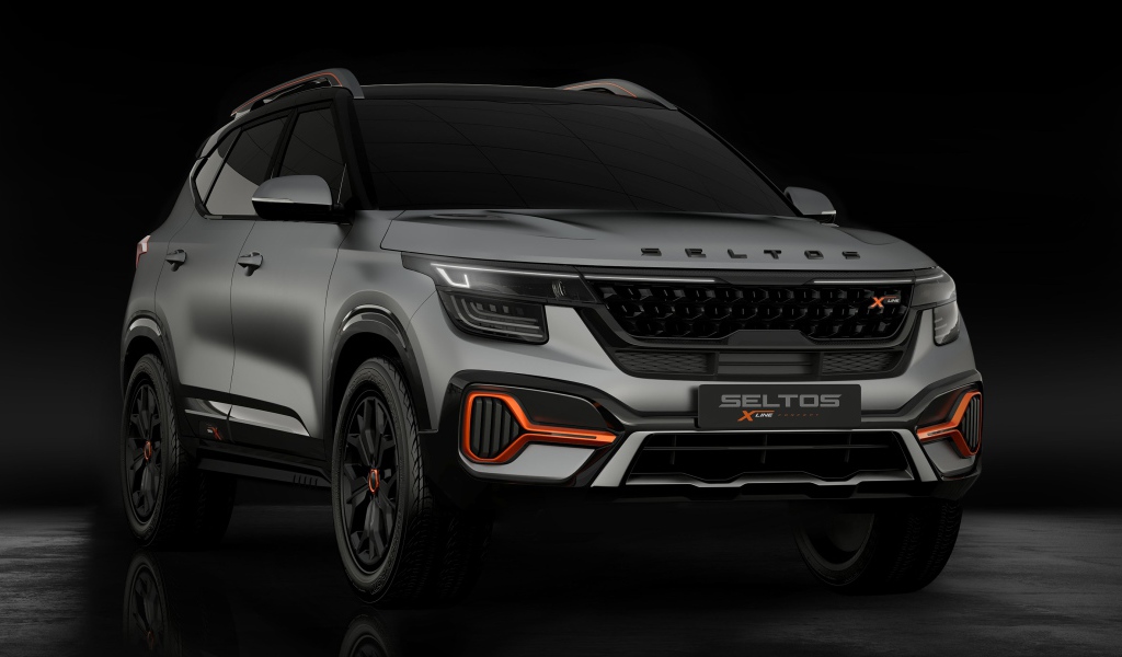 Автомобиль Kia Seltos X-Line Concept 2020 года на черном фоне 