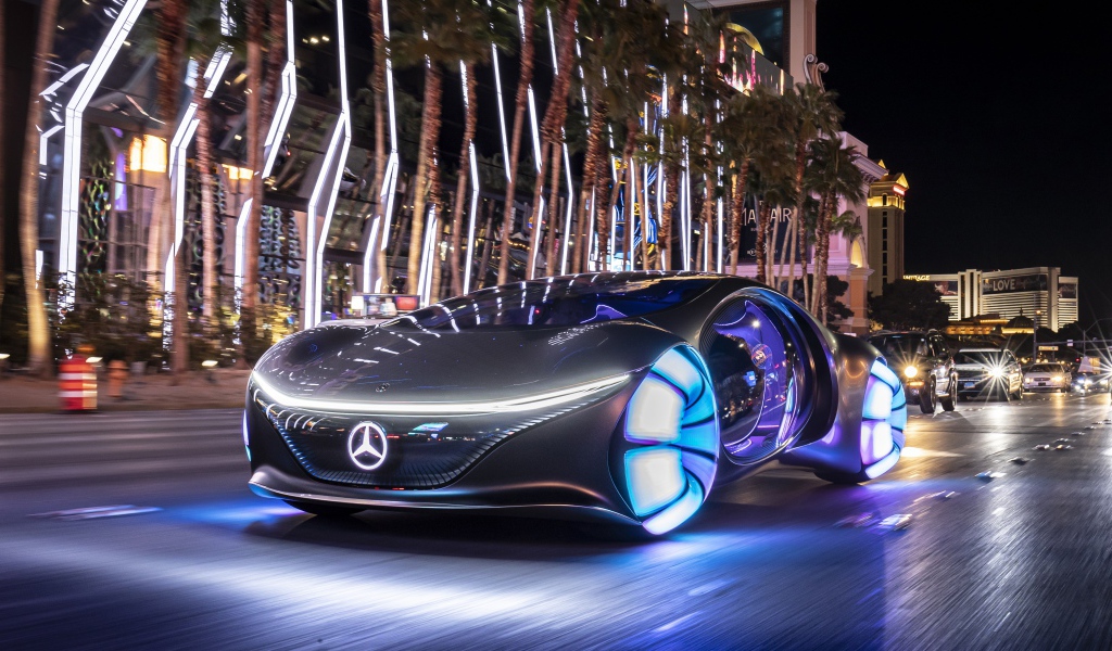Автомобиль Mercedes-Benz VISION AVTR, 2020 года с неоновыми колесами на улице