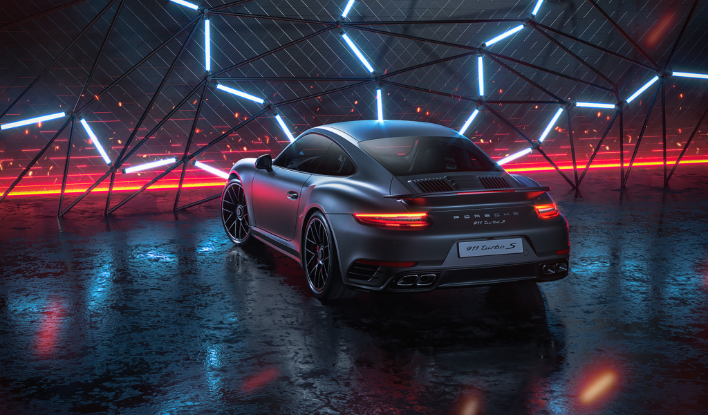 Серебристый автомобиль Porsche 911 Turbo S 