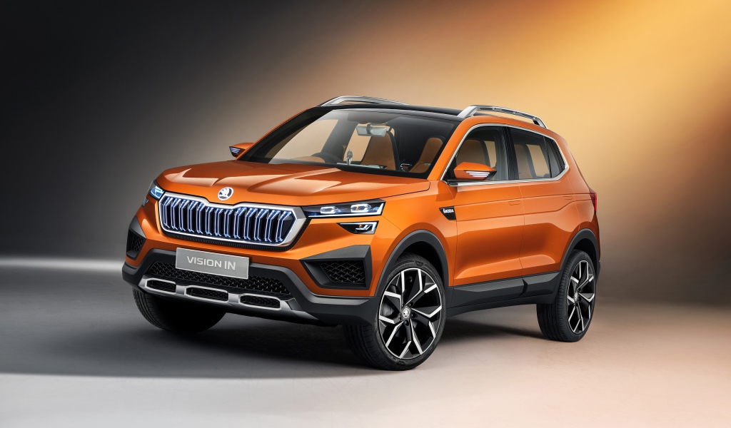 Оранжевый внедорожник Skoda Vision IN 2020 года