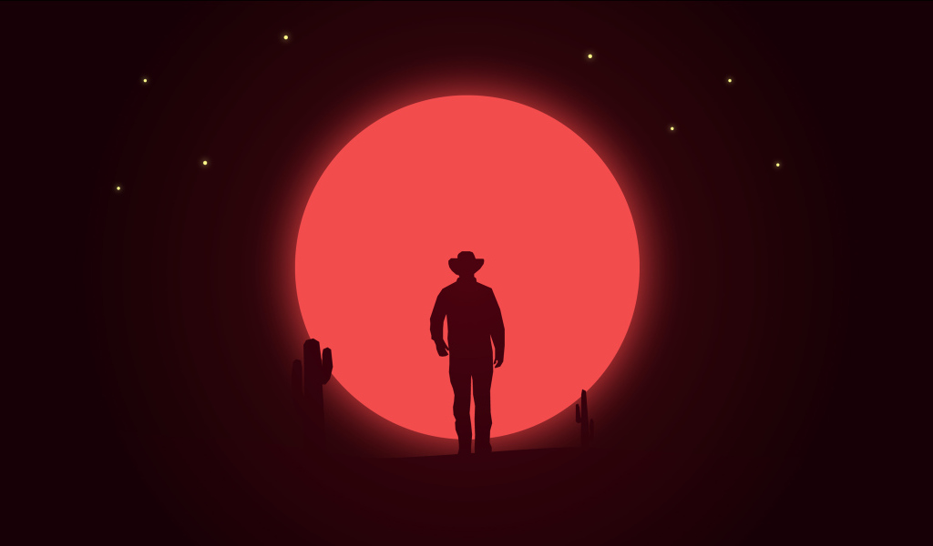 Силуэт ковбоя на фоне красной луны