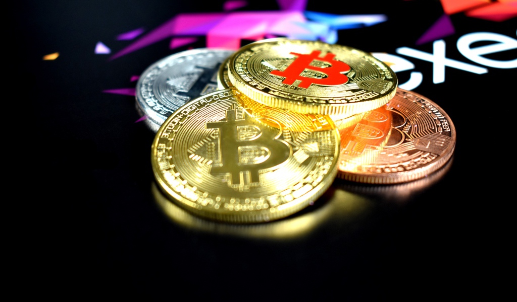 Bitcoin coins on black table