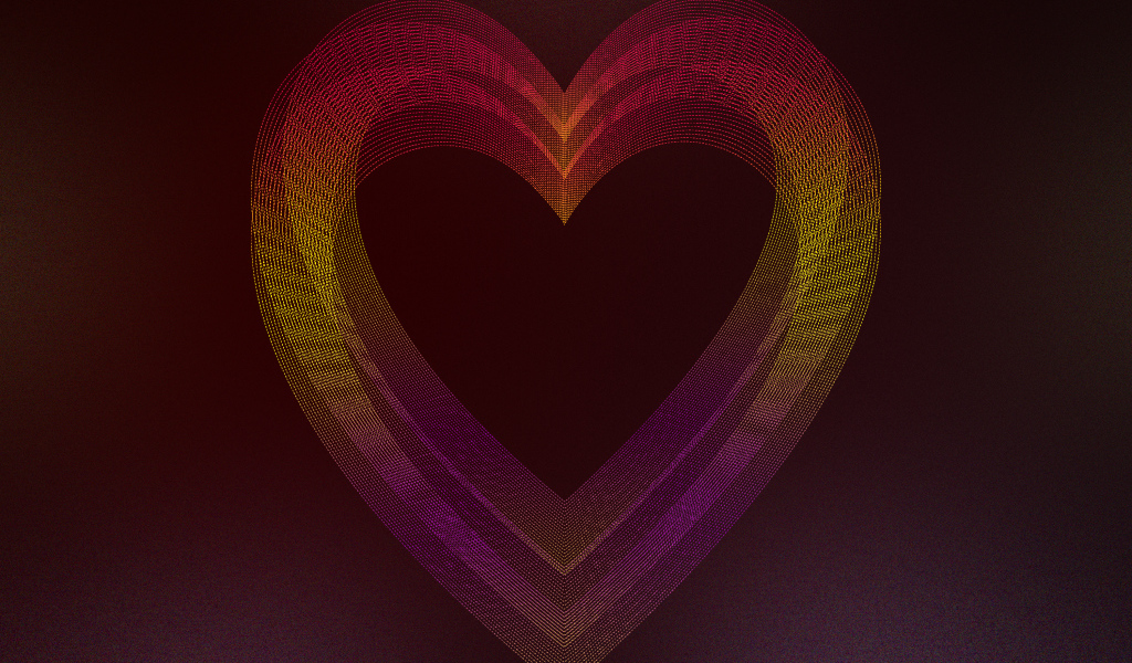 Большое неоновое сердце на бордовом фоне