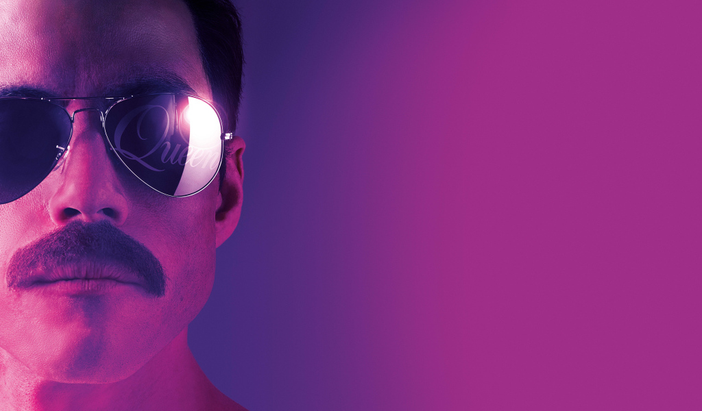 Легендарный певец Фредди Меркьюри на розовом фоне