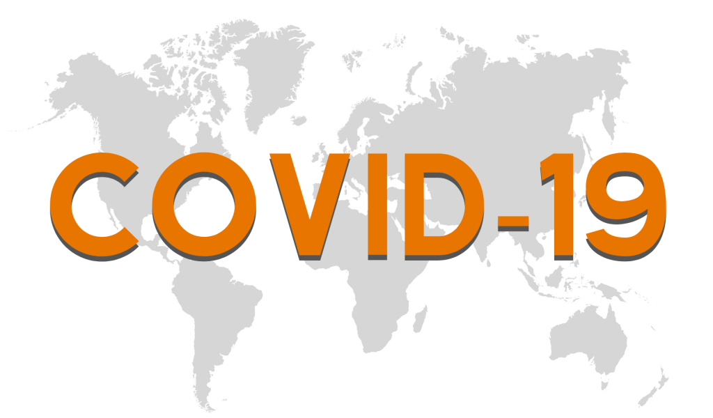 Большая надпись COVID 19 на фоне карты 