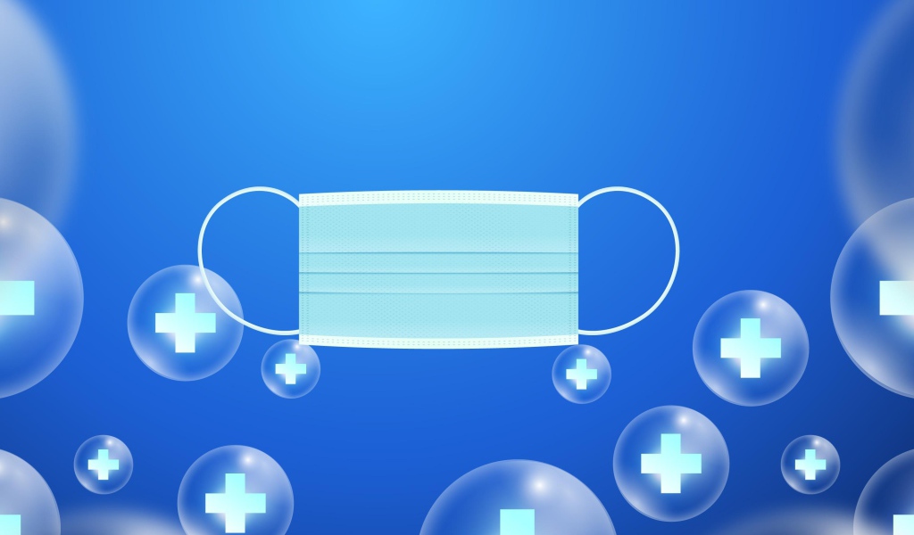 Медицинская маска от коронавируса на голубом фоне 