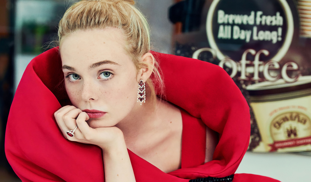 Beautiful girl, actress El Fanning in a red outfit