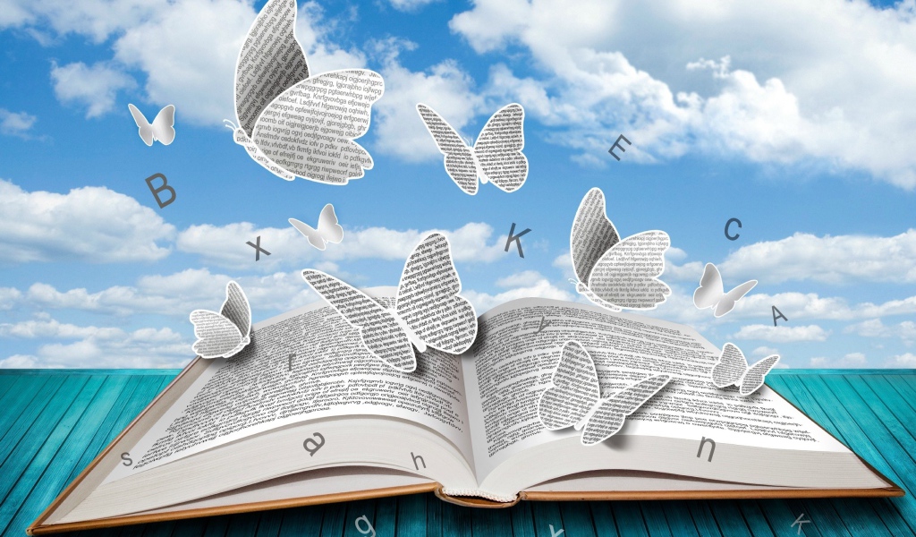 Бумажные бабочки и буквы над книгой 