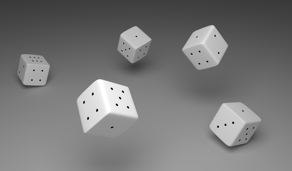 Белые игральные кости в воздухе на сером фоне