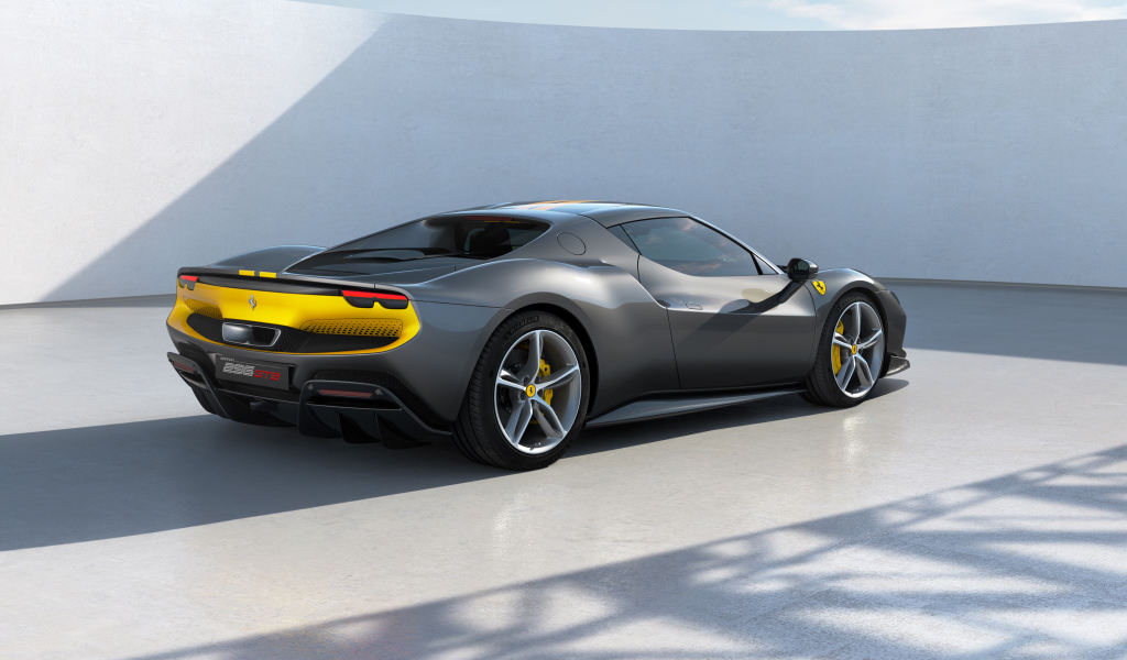 Быстрый автомобиль Ferrari 296 GTB Assetto Fiorano 2022  года вид сзади