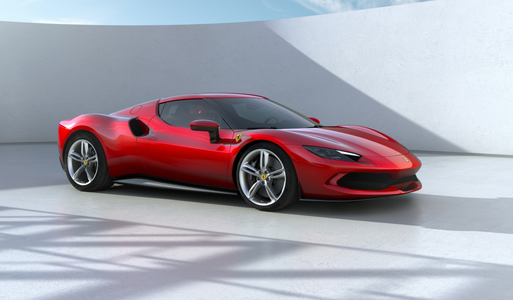 Красный спортивный автомобиль Ferrari 296 GTB 2022 года