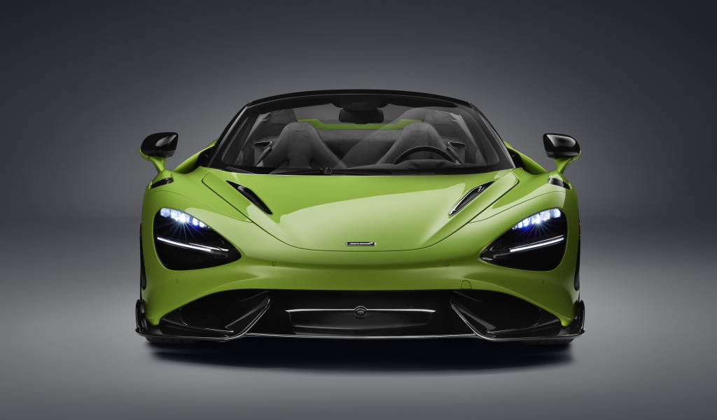 Зеленый McLaren 765LT Spider 2022 года а сером фоне 