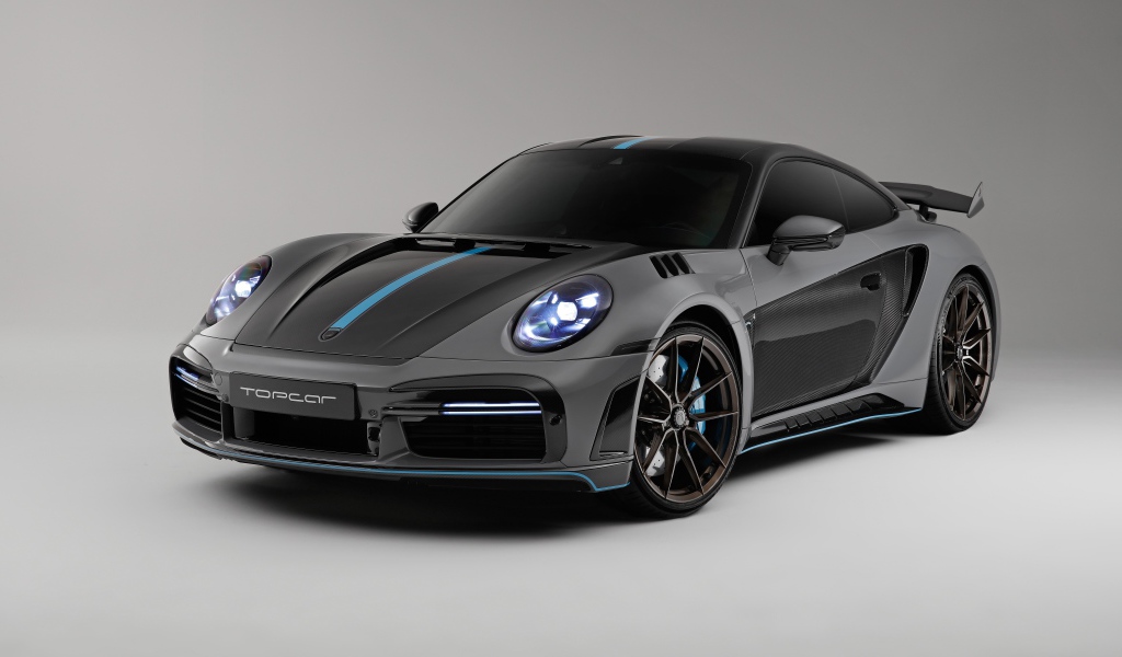 Спортивный автомобиль Porsche 911 Turbo S Stinger GTR 3 2021  года на сером фоне