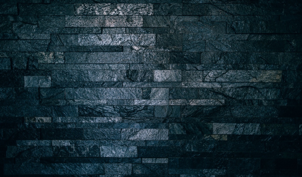 Черная гранитная стена крупным планом 