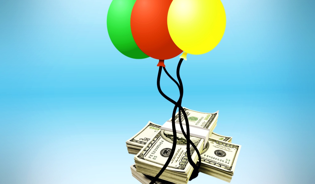 Деньги с воздушными шариками на голубом фоне 