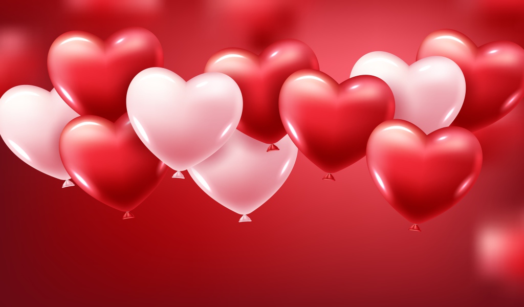 Белые и красные шарики в форме сердца на красном фоне