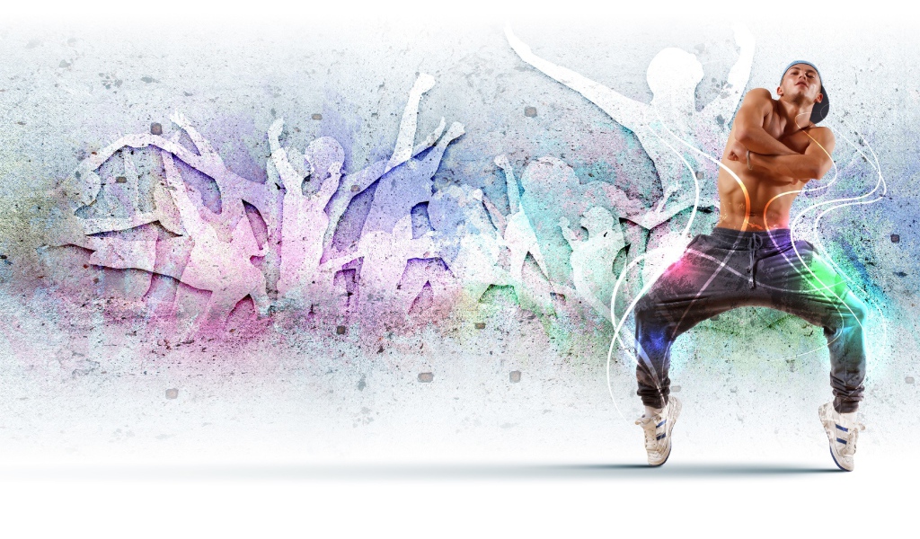 Парень танцор на фоне стены 