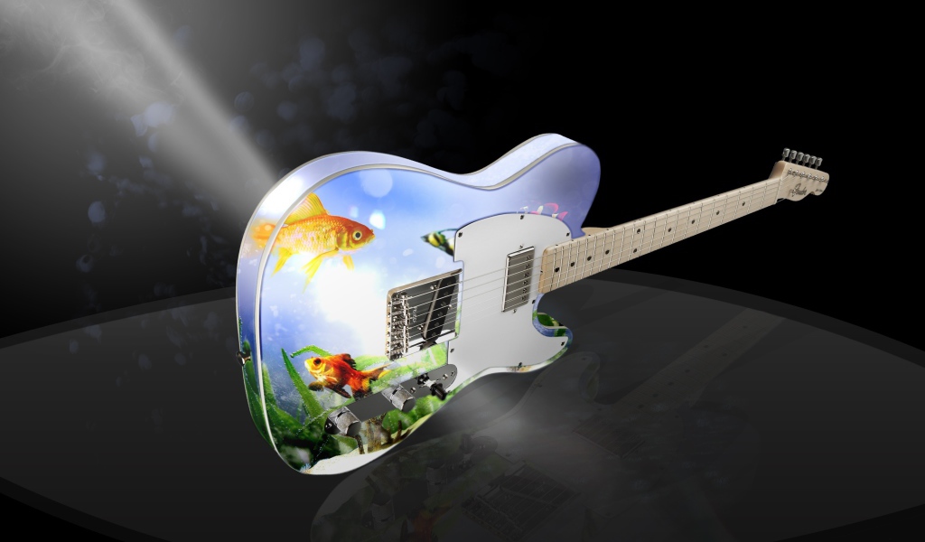 Гитара с рисунком в свете софитов