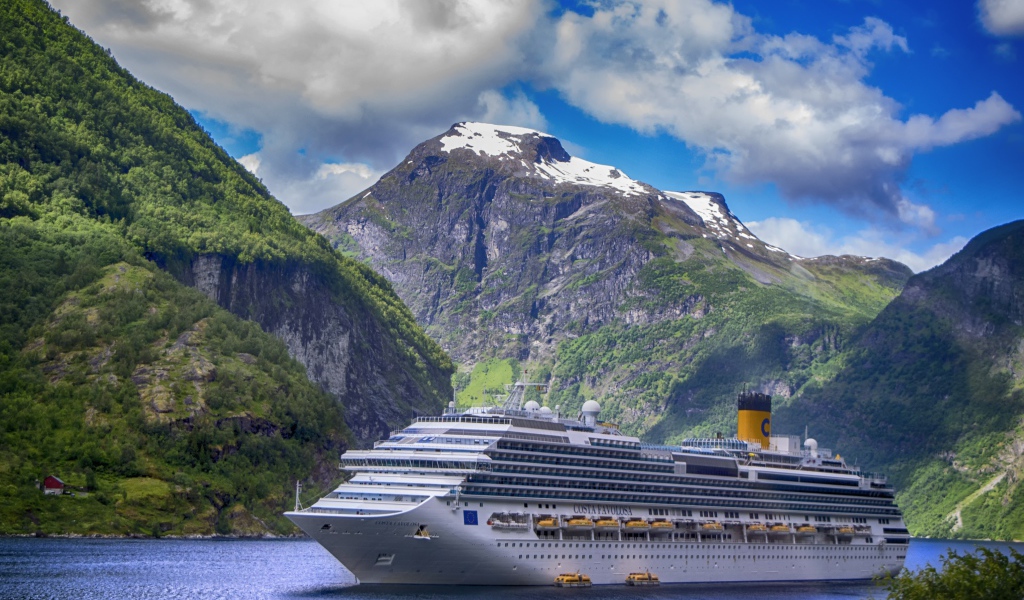 Big white cruise ship in the fjord