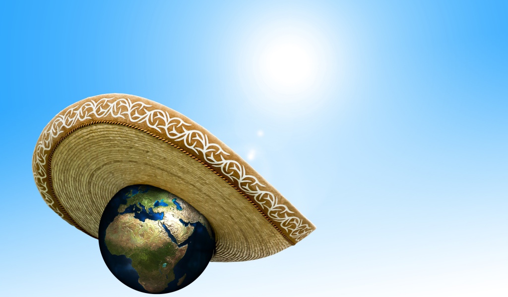 Планета земля в сомбреро на голубом фоне