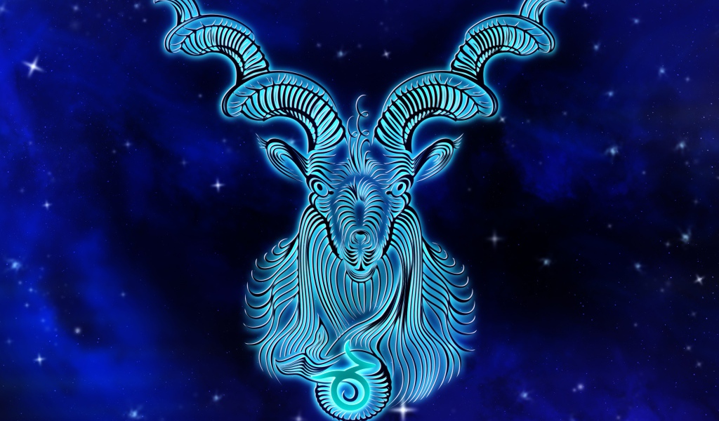 Красивый знак зодиака козерог на синем фоне