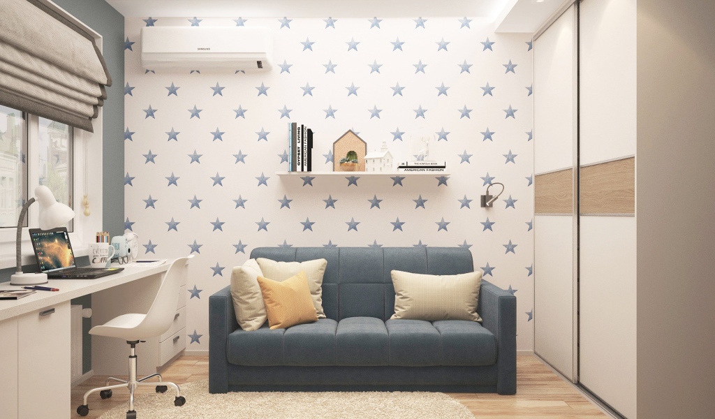 Серый диван с подушками в комнате 