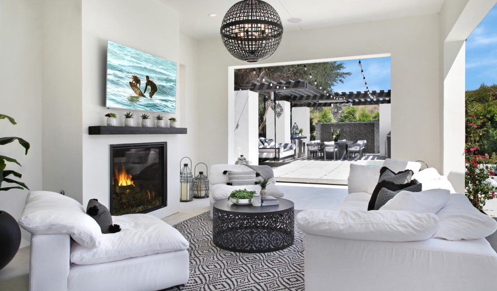Stylish black and white interior in a room with access to the terrace