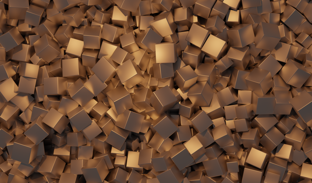 Много золотых кубов крупным планом