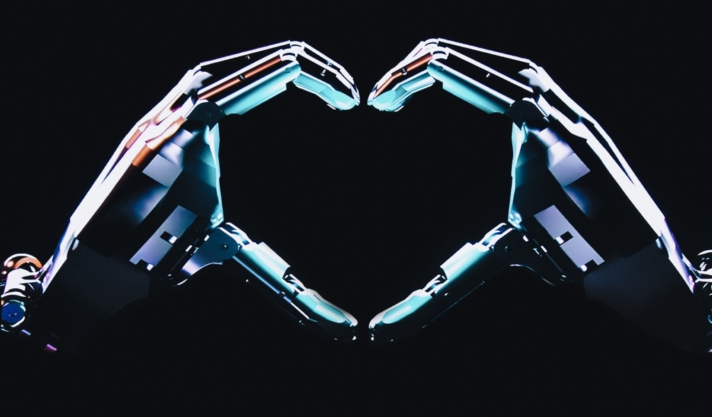 Робот делает сердце руками