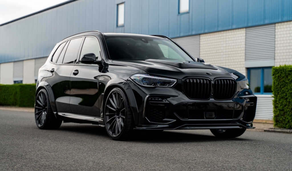 Черный автомобиль Prior-Design PDG5XWB Widebody Aerodynamic Kit