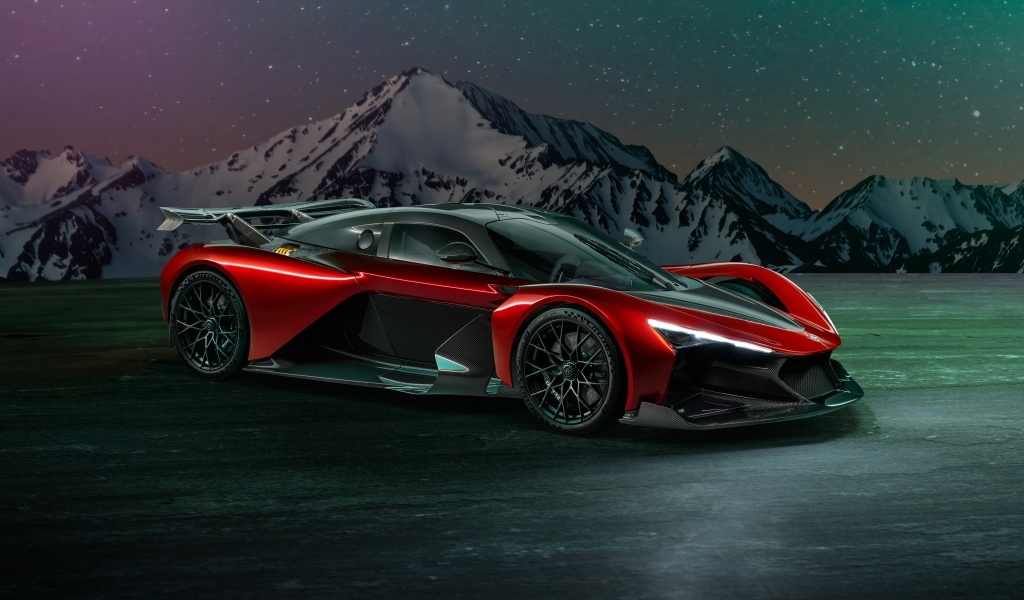 Красный спорткар Zenvo Aurora Agil  на фоне гор