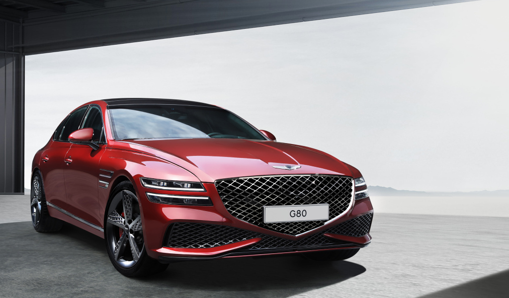 Стильный Genesis G80 Sport 2023 года вид спереди