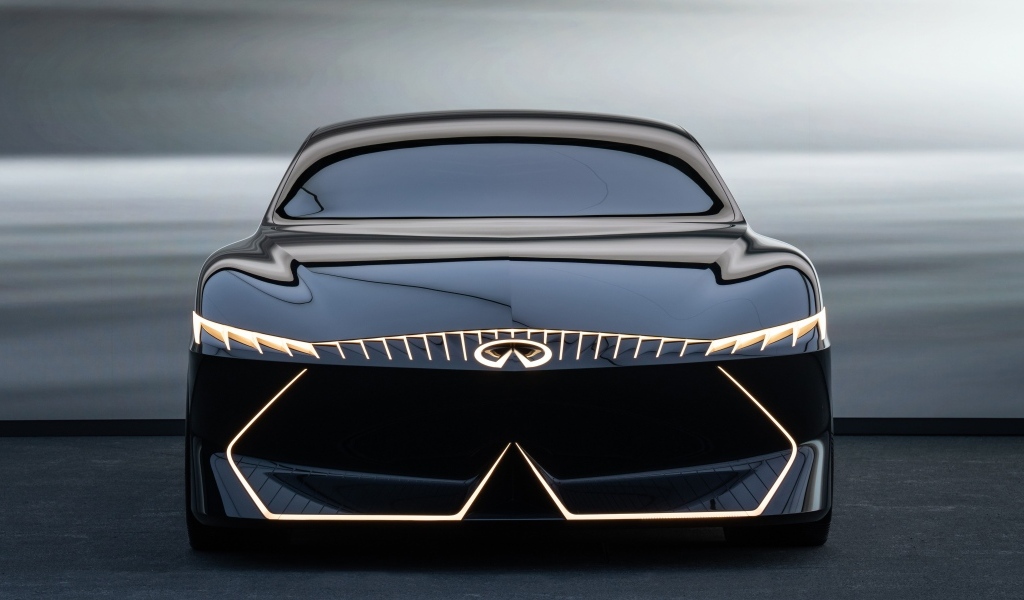 Красивый вид спереди на автомобиль Infiniti Vision Qe 2023 года